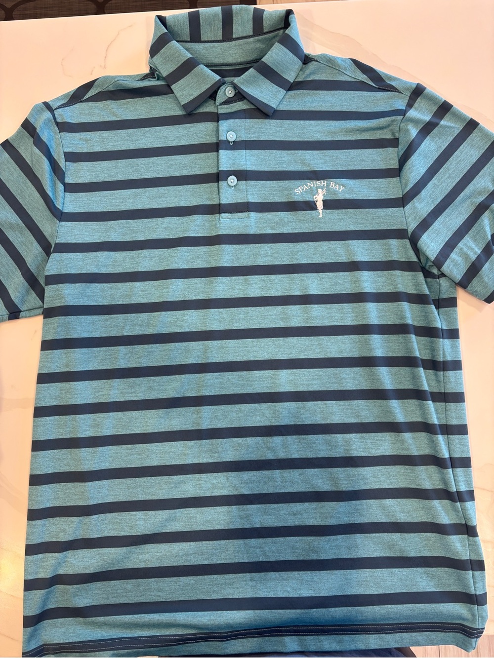 Under Armour x Spanish Bay Pebble Beach Men’s Teal & Navy Striped Polo